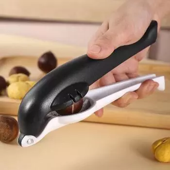 Открывалка для каштанов Острые перекрестные лезвия Длинная ручка Удобная ручка Нескользящая Экономия усилий Эффективный орехокол розовый