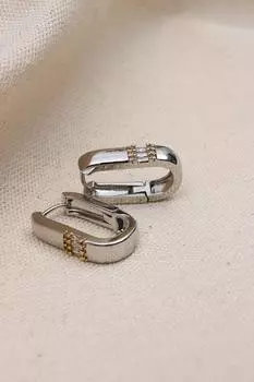 Овальные стальные серьги серебряного цвета с камнем-багетом