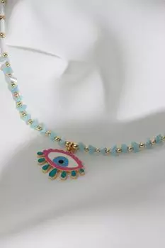 Ожерелье из белых бусин с разноцветными эмалированными подвесками в виде глаз