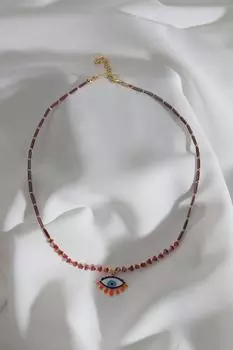Ожерелье из красных бусин с разноцветными эмалированными подвесками в виде глаз