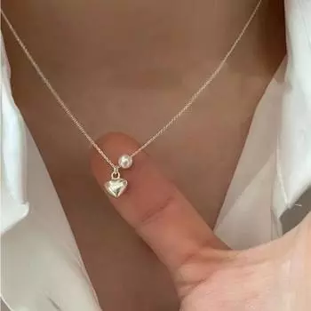 Ожерелье из стерлингового серебра 925 пробы с жемчугом и сердцем Трехмерный кулон в форме сердца Серебряные аксессуары Простой холодный стиль Свет Роскошный дизайн меньшинства 925