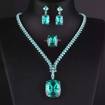 Ожерелье с аквамариновым топазом 20 карат, цветные серьги-гвоздики, кольцо «Параиба», комплект из королевских синих и желтых бриллиантов