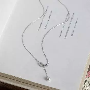 Ожерелье с кисточкой и бантом, женская легкая роскошная темпераментная цепочка из нержавеющей стали в форме буквы Y с имитацией жемчуга на ключицу
