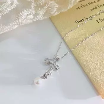 Ожерелье с жемчугом в виде банта, модное, легкое и роскошное, элитное, цепочка на ключицу, для поездок на работу, нишевый дизайн