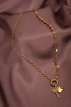 Ожерелье золотого цвета с хрустальным камнем медового цвета