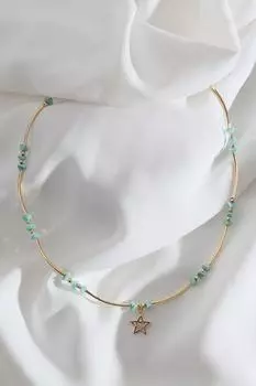 Ожерелье золотого цвета с подвеской в виде звезды из зеленой бусины и детали трубы