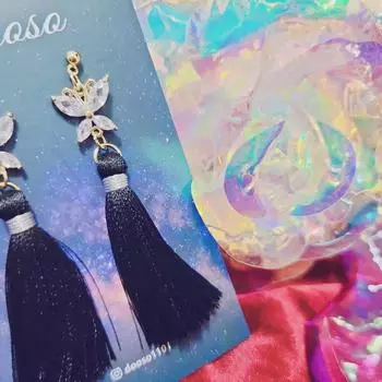 Papan 14 And Hades Themed Earrings Are On Sale.