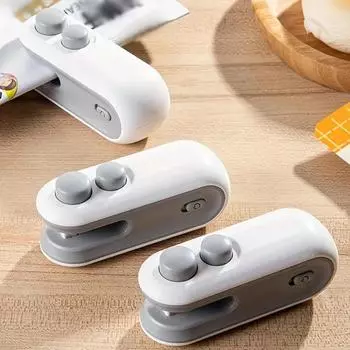 Перезаряжаемый мини-запечатщик пакетов с закусками 2-в-1 с резаком, термовакуумный упаковщик для хранения свежих продуктов синий