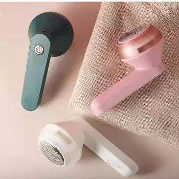 Перезаряжаемый триммер для волос Yangzi: Компактная бытовая бритва для ткани белый