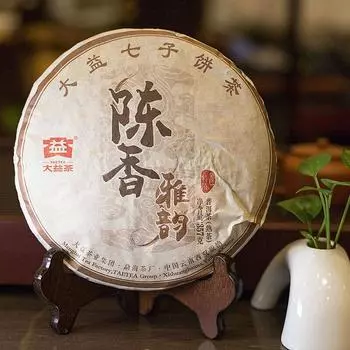 Пирожное Чай Пуэр Aged Aroma Menghai Dayi TAETEA 2015 г. Приготовленный спелый 357г 357g