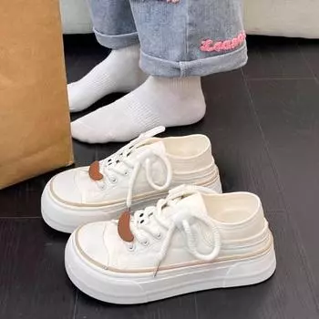 Platform canvas shoes women s 2025 new spring and autumn Internet celebrities super fire with skirt little white shoes board shoes design sense niche 35
