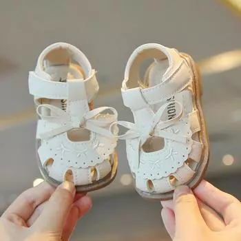 Пляжная обувь для девочек Простые бантики Т-образный ремешок Детская обувь для ходьбы Мягкая подошва Нескользящая 2025 Лето Новые Сандалии для малышей Ажурные Трендовые 15 бежевый