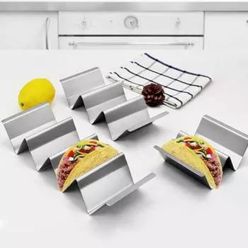 Подставка для тако из нержавеющей стали. Двусторонняя вмещает 3 или 2 тортильи. Штабелируемая подставка для удобного хранения. Треугольная внутренняя часть предотвращает разливы. Антипригарное покрытие. S