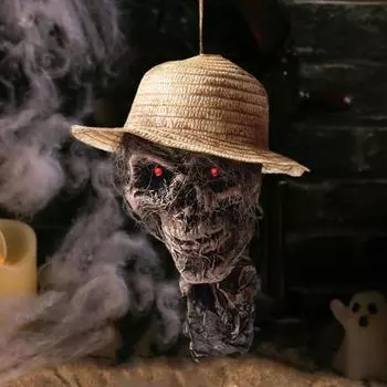 Подвесной реквизит в виде черепа в соломенной шляпе с активацией звуком и светящимися глазами
