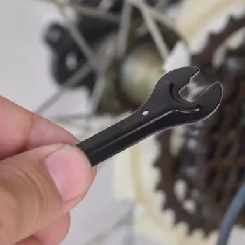 Полезный конусный ключ для ступицы Общая термообработка Четыре отверстия для обслуживания Прочный гаечный ключ для ступицы велосипеда для ремонта чёрный