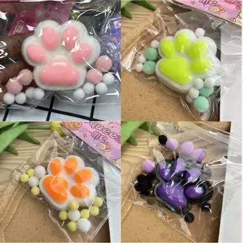 Пончик в сливочной панировке с рисунком в виде кошачьих когтей — вдохновленный музыкой и медленный отскок, стиль Сяохуншу. 7cm, glossy белый/оранжевый