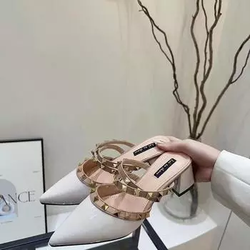 Popular French summer new 2025 thick heel lightweight rivet shoes bag head cool slippers women go out pointed versatile 34 чёрный