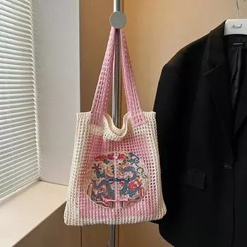 Popular large-capacity woven tote bag women s new commuter seaside vacation style shoulder armpit bag розовый