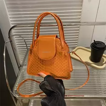 Популярная сумка Niche Design для женщин 2024 года, новая корейская версия простой и модной портативной сумки через плечо, фактурная иностранная сумка-тоут оранжевый