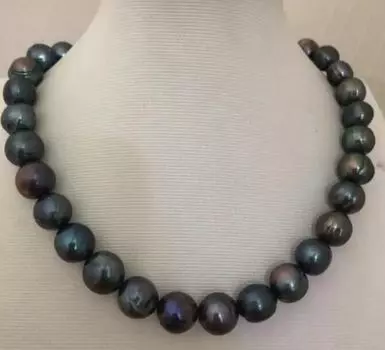 Потрясающее колье из таитянского барокко с черным зеленым жемчугом диаметром 9–10 мм, длина 18 дюймов.