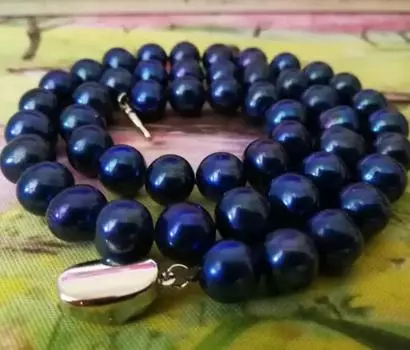 Потрясающее круглое ожерелье с таитянским черным жемчугом диаметром 9-10 мм.