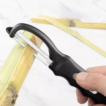 Поворотная овощечистка с средством для удаления пятен Двойные лезвия из нержавеющей стали Удобная ручка Легко чистящаяся овощечистка для кухни чёрный