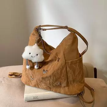 Повседневная сумка большой вместимости женская 2024 осень и зима новый нишевый дизайн рюкзак одно плечо пригородный косой спан сумка