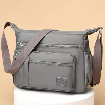 Повседневная женская сумка из нейлоновой ткани, универсальная сумка через плечо, модная, дорожная, новый стиль, простая и легкая, большая вместимость, женская сумка через плечо 30x10x20cm чёрный