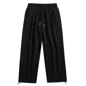 Повседневные брюки для мужчин в гонконгском стиле: Модный, драпированный дизайн, свободный крой, идеально подходит для весны и осени. 3XL чёрный