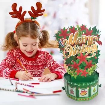 Поздравление с Рождеством. Милая рождественская открытка с 3D-цветком и зеленой английской буквой. зелёный