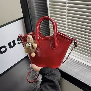 Премиальная текстура портативная маленькая сумка-ведро женская 2025 новая простая сумка иностранный стиль мини сумка через плечо