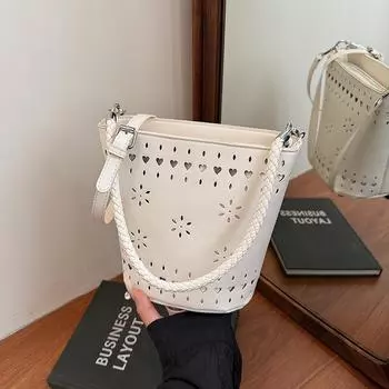 Премиальная женская сумка на одно плечо, летняя новая нишевая сумочка, полая сумка через плечо, сумка под мышкой, сумка-ведро