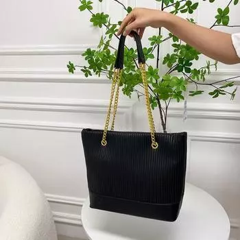 Простота и универсальность женской сумки. Весна/лето 2024. Новая ручная сумка-мешок. Модная и модная, универсальная сумка через плечо для поездок на работу.