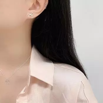 Простые серьги-бантики для женщин. Свежие и универсальные серьги-ниши.