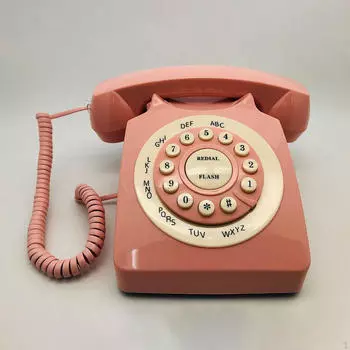 Проводной стационарный телефон с кнопкой в традиционном стиле ретро для офиса зелёный