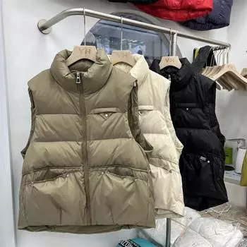 Пуховый жилет женский зимний новый заклепки короткий белый утиный пух воротник стойка свободный жилет без рукавов верхняя одежда One size чёрный