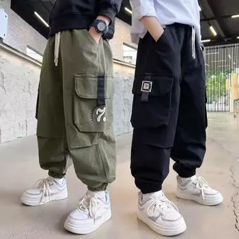 Рабочие брюки для мальчиков, осенние модели, красивые брюки, детские модные карманы, повседневные брюки, свободные детские брюки среднего и большого размера. 120 чёрный