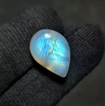 Размер кулона Ultimate Fire Natural, кабошон из белого радужного лунного камня, 22,45 карата, размер 22x14x10 мм. 22.45 Carat 22x14x10 MM