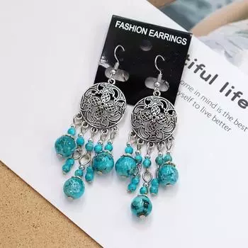 Retro elegant hollow long fringed earrings women s simple temperament versatile earrings personalized earrings