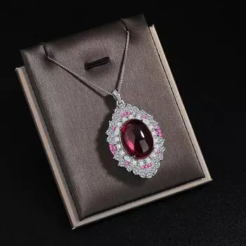 Ретро имитация цветного сокровища в форме яйца с полым красным стальным нефритом и инкрустацией циркония copper белого золота