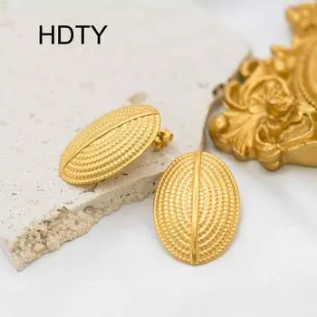 Retro light luxury niche design sense fashion stud earrings geometric oval polka dot titanium steel 18k gold earrings золотой