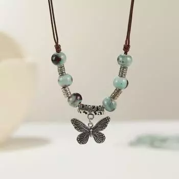 Retro literary and artistic ceramic butterfly necklace female long fringed sweater chain with jewelry collarbone chain