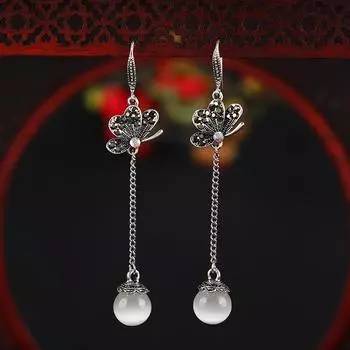 Retro long temperament earrings, opal fringed earrings, women s simple and versatile diamond-set antique ear jewelry.