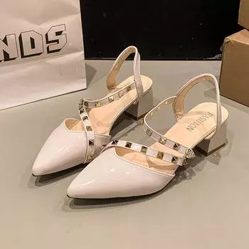 Rivet bag head sandals women s thick heel 2025 spring and summer new willow nails Roman fashion patent leather pointed beige wedge heel cool 35