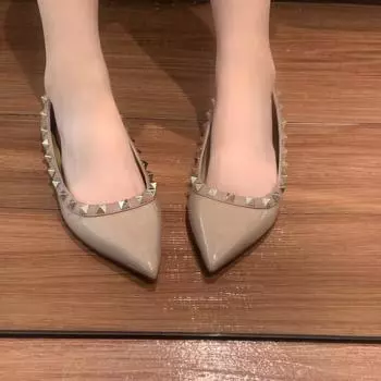 Rivet pointed flat-soled single shoes women s fashion 2024 spring and summer new patent leather versatile one-pedal shallow-heeled boat shoes 34