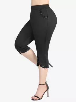 Rosegal Большие размеры Капри с кружевной отделкой и карманами с заклепками и подолом-тюльпаном Леггинсы-капри L чёрный