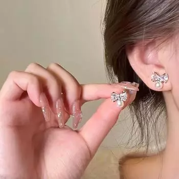 Роскошные серьги-бантики из циркония S925 с жемчужной подвеской для женщин - нишевый дизайн 2025 года. Bow Zirconia Earrings