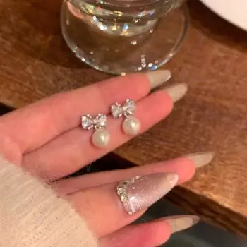 S925 Silver Needle Light Luxury Niche Delicate Zircon Bow Earrings Women S Tide Premium Pearl Earrings Earrings