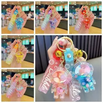 Сахарные бобы мультяшный космический человек кулон зыбучие пески бутылка плавающая нефть жидкость брелок студент жёлтый