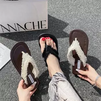 Сандалии на плоской подошве женские 2024 новые кисточки на носке модные темпераментные повседневные туфли для отдыха на море пляжные туфли для прилива 35 чёрный